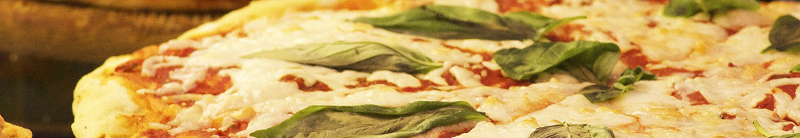 Eating Italian Pizza Sandwich at Sorrento Pizzeria restaurant in Ilion, NY.